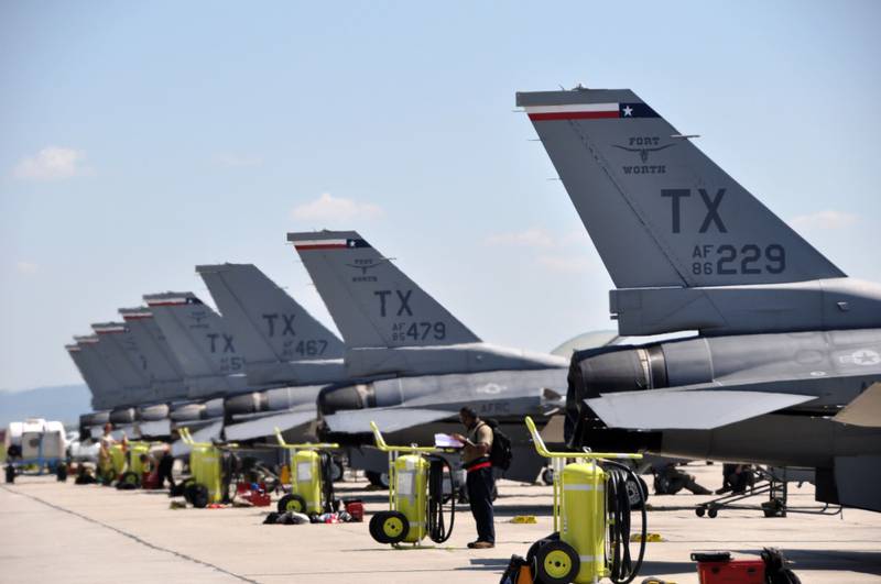 F-16C Fighting Falcons assigned to the 457th Expeditionary Fighter Squadron are parked on the flight line at the 71st Air Base, Campia Turzii, Romania, June 26, 2019. (Master Sgt. Megan Crusher/Air Force)
