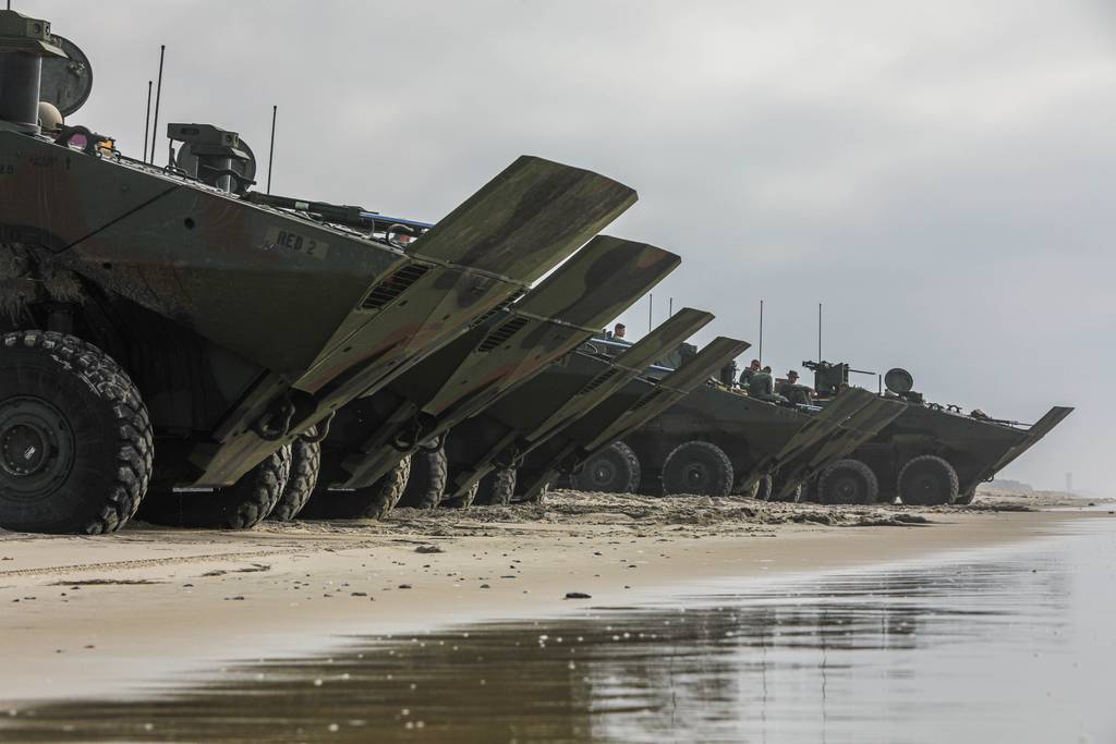 Marines with Charlie Company, 3d Assault Amphibian Battalion, 1st Marine Division, prepare amphibious combat vehicles for waterborne operations at Marine Corps Base Camp Pendleton, California, Jan. 7, 2022.