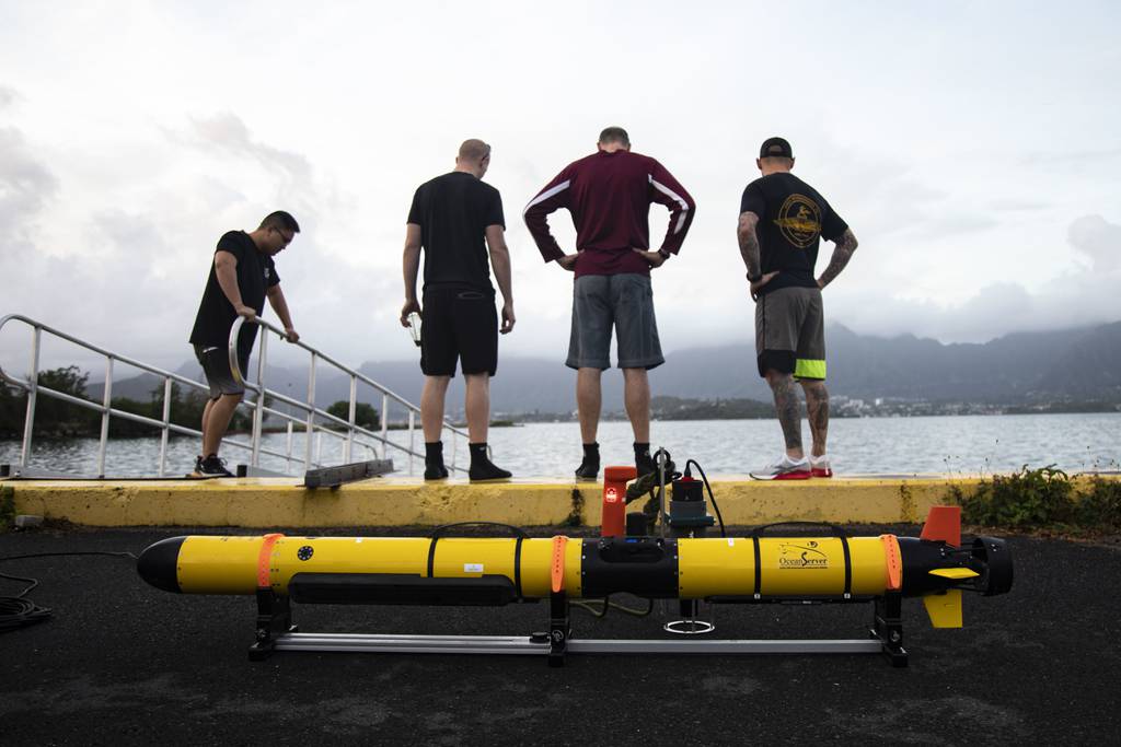 An unmanned underwater vehicle is seen as personnel with Marine Corps Systems Command look at the ocean in January 2020.