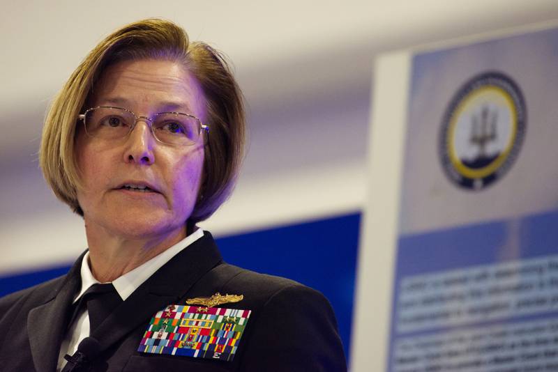 Vice Adm. Kelly Aeschbach, commander of Naval Information Forces, speaks on the exhibit floor April 8, 2024, at the Sea-Air-Space conference in Maryland.