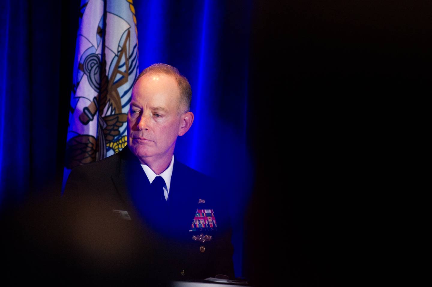 Rear Adm. Doug Small, the U.S. Navy’s Project Overmatch boss, pauses before answering a question about unmanned technologies at the 2024 Sea-Air-Space conference in National Harbor, Maryland.