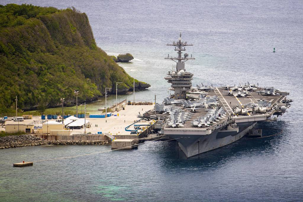 The aircraft carrier USS Theodore Roosevelt (CVN 71) is moored pier side at Naval Base Guam May 15, 2020.