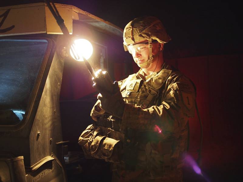 Staff Sgt. Thornton, a mortarman, conducts a radio check with his forward observer in Afghanistan on Aug. 31, 2013.