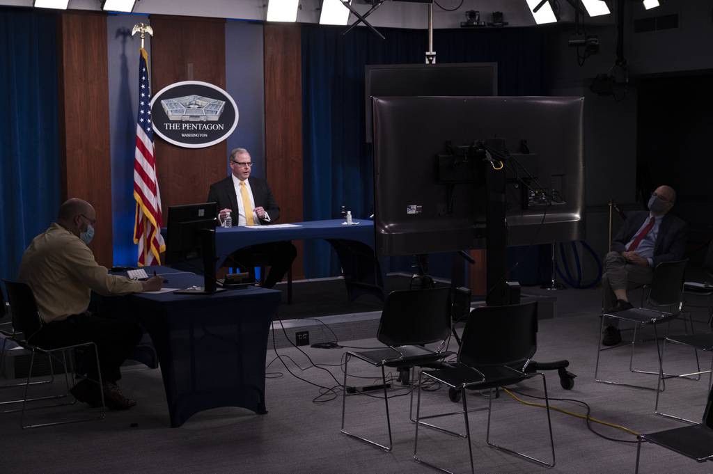 John Sherman, now the U.S. Department of Defense's chief information officer, presents a keynote address from the Pentagon briefing room for the Cyber Beacon virtual event in December 2020.
