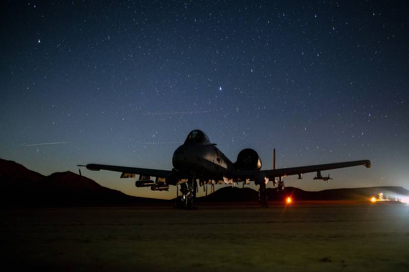 An A-10 Thunderbolt II assigned to Davis-Monthan Air Force Base, is parked in a dry lakebed during Green Flag-West at Fort Irwin, California, Jan. 19, 2022. Green Flag-West is a realistic air-land integration combat training exercise involving the air forces of the United States and its allies. (Airman 1st Class Josey Blades/Air Force)