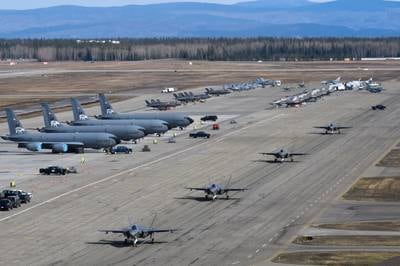 U.S. Air Force, Navy, Marine Corps, Royal Air Force and Royal Australian Air Force aircraft sit on the flightline at Eielson Air Force Base, Alaska, during Northern Edge 23-1.