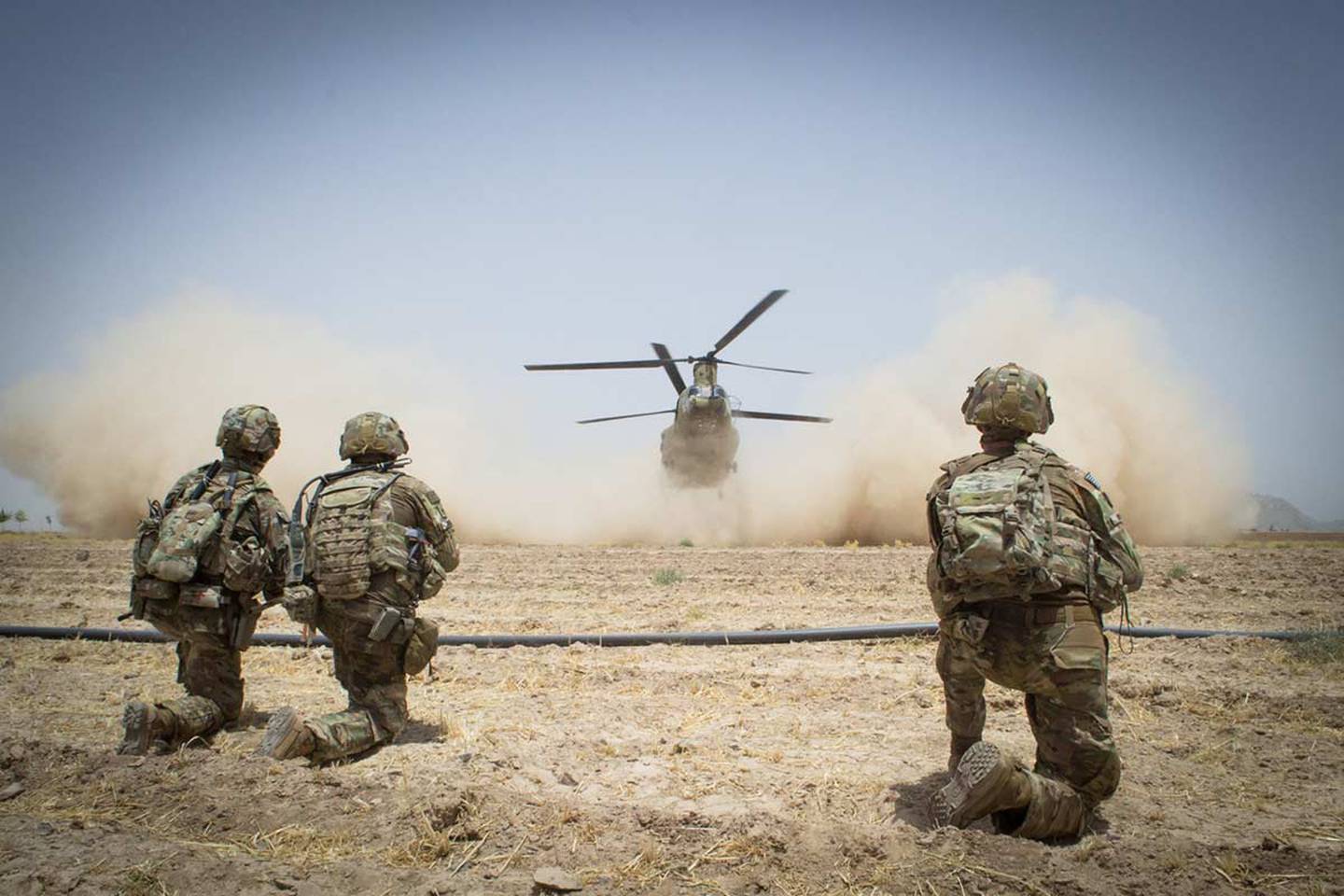 Paratroopers secure a helicopter landing zone for a CH-47 Chinook helicopter, July 20, 2019, in Kandahar Province, Afghanistan.