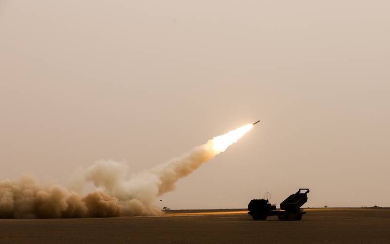 Soldiers fire the High Mobility Artillery Rocket System, or HIMARS, during the African Lion 2021 exercise at Guirer Libouihi Air Base in June 2021.