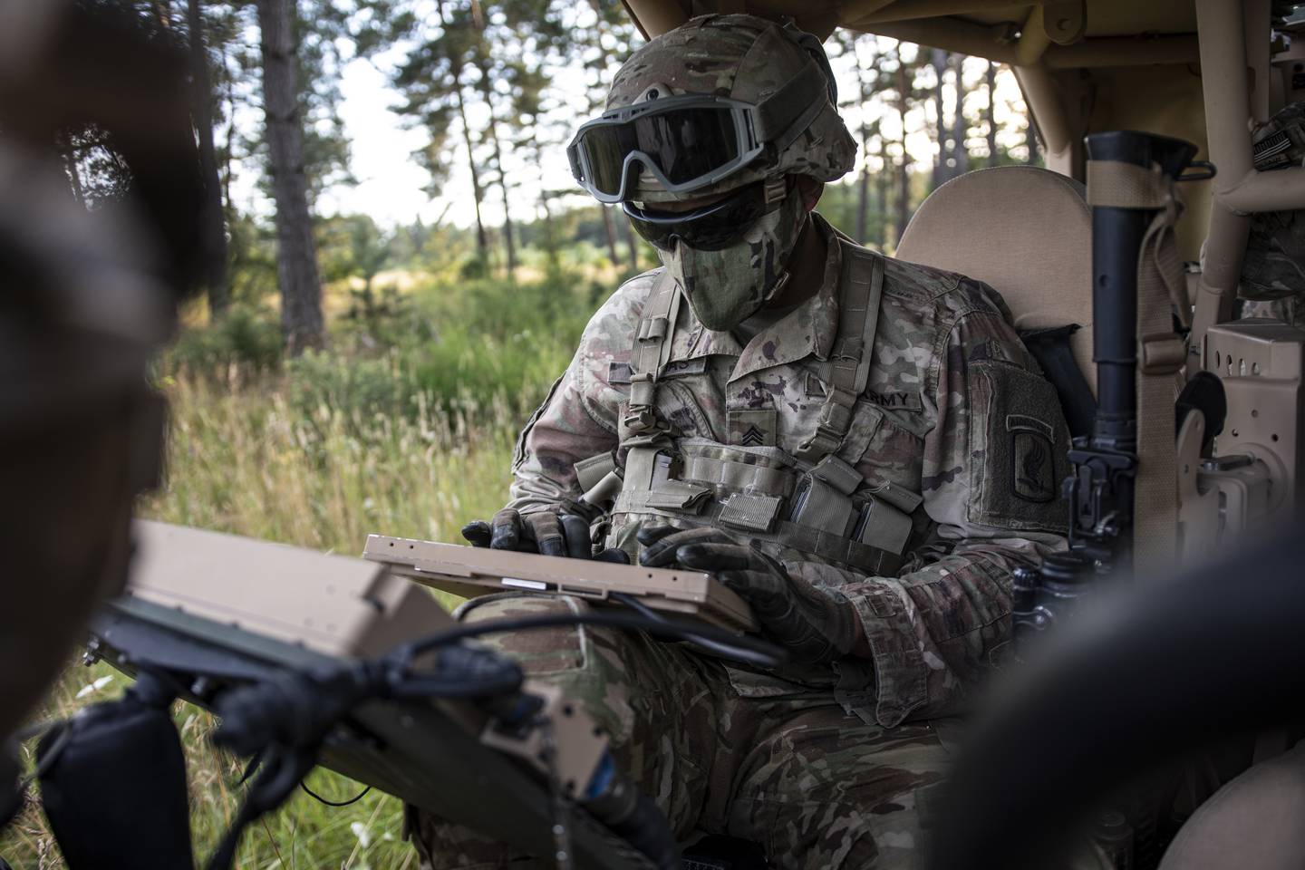 Sgt. Vargas, a U.S. Army paratrooper assigned to 54th Brigade Engineer Battalion, 173rd Airborne Brigade, uses electronic warfare equipment at Grafenwoehr Training Area, Germany, July 28, 2020.