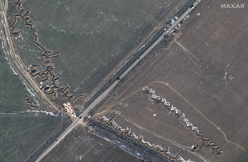 This satellite image provided by Maxar Technologies shows fortifications and dragons in Medvedivka, Crimea, Feb. 11, 2023.