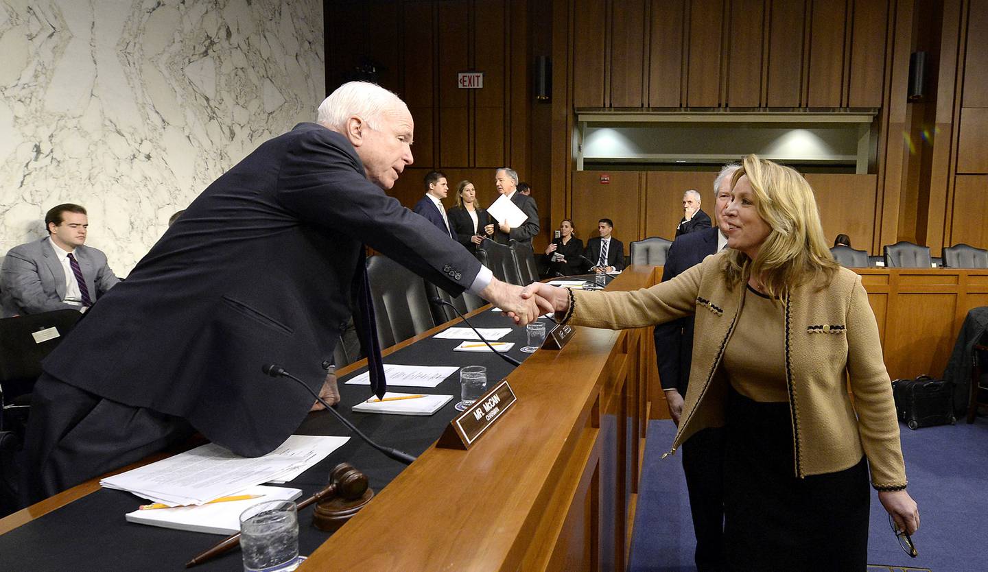 Then-Air Force Secretary Deborah Lee James, right, greets Sen. John McCain, R-Ariz., before a Senate Armed Services Committee hearing in 2016. (Scott M. Ash/U.S. Air Force)