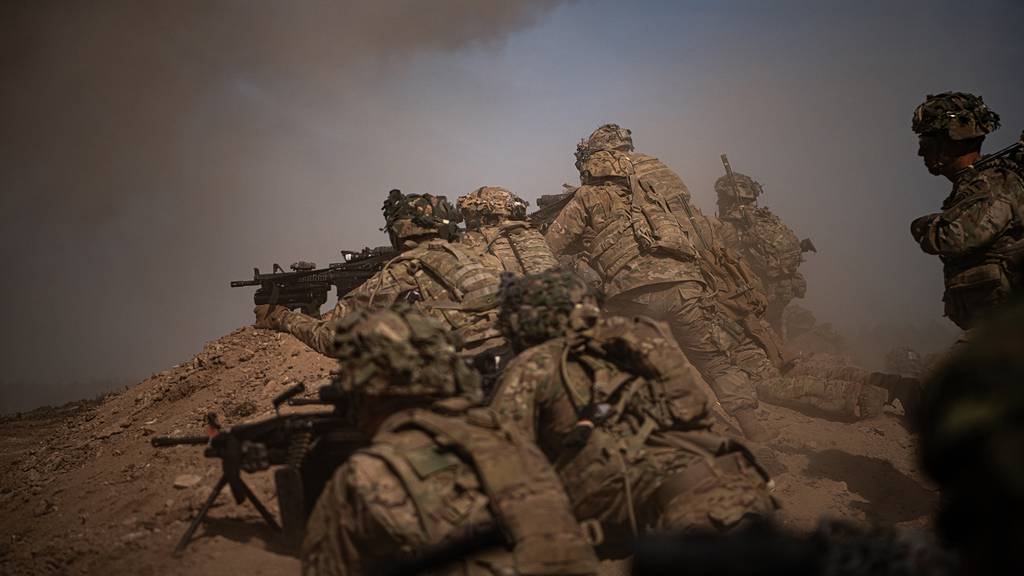 U.S. Army paratroopers move up on a berm to provide security for the assaulting element on July 29, 2020, during a company live fire exercise as part of the 173rd Brigade Field Training Exercise in Grafenwoehr Training Area, Germany from July 17 to Aug. 5, 2020.