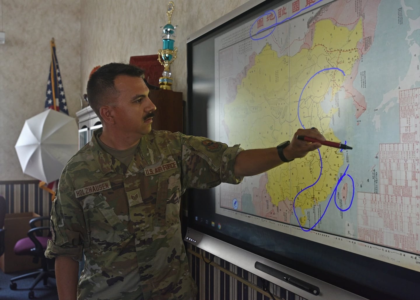 Air Force Staff Sgt. Uruwishi Holzhausen, 314th Training Squadron military language instructor, discusses the geography of China at the Presidio of Monterey, California, July 21, 2021. (Senior Airman Ashley Thrash/Air Force)