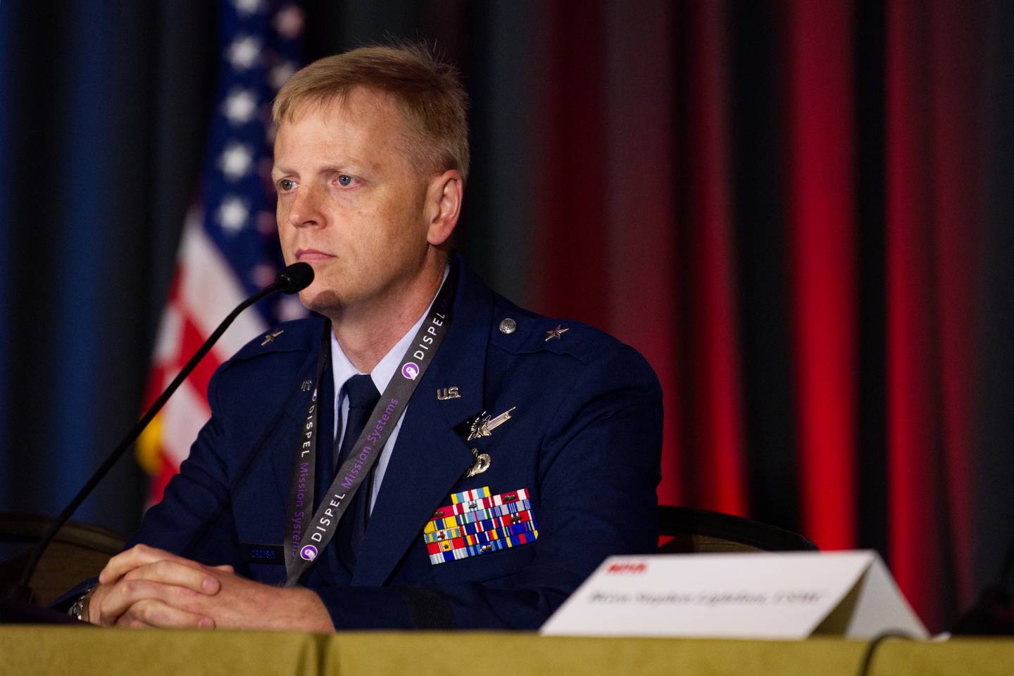 U.S. Air Force Brig. Gen. Luke Cropsey, a key player in the service's Joint All-Domain Command and Control efforts, listens to a question at a National Defense Industrial Association event July  18, 2023.
