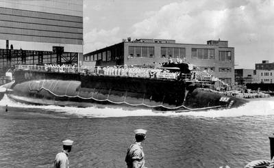 In this July 9, 1960, file photo, the U.S. Navy nuclear powered attack submarine USS Thresher is launched bow-first at the Portsmouth Navy Yard in Kittery, Maine.