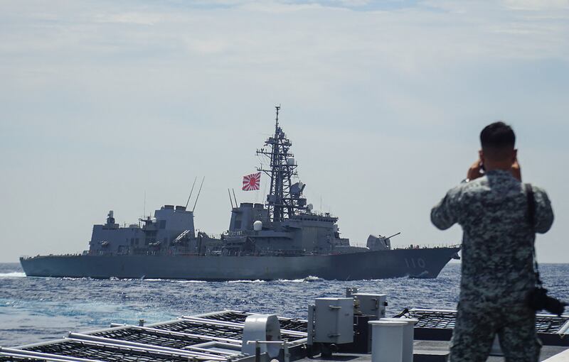 Japan’s Cabinet OKs record defense budget that aims to deter China