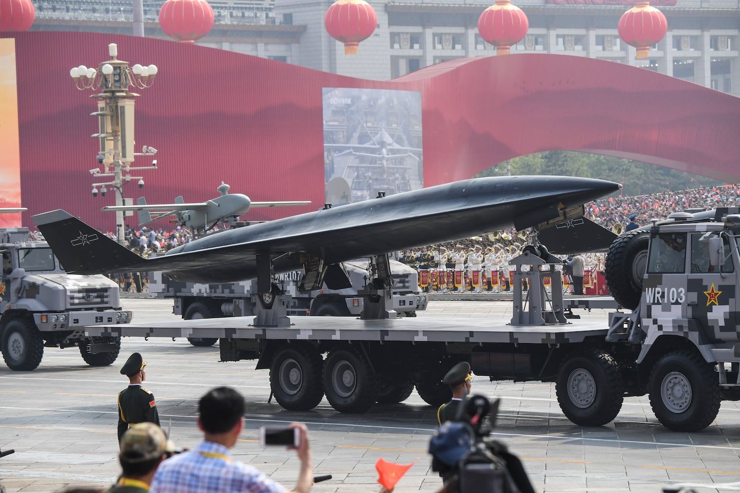 China unveils drones, missiles and hypersonic glide vehicle at military ...