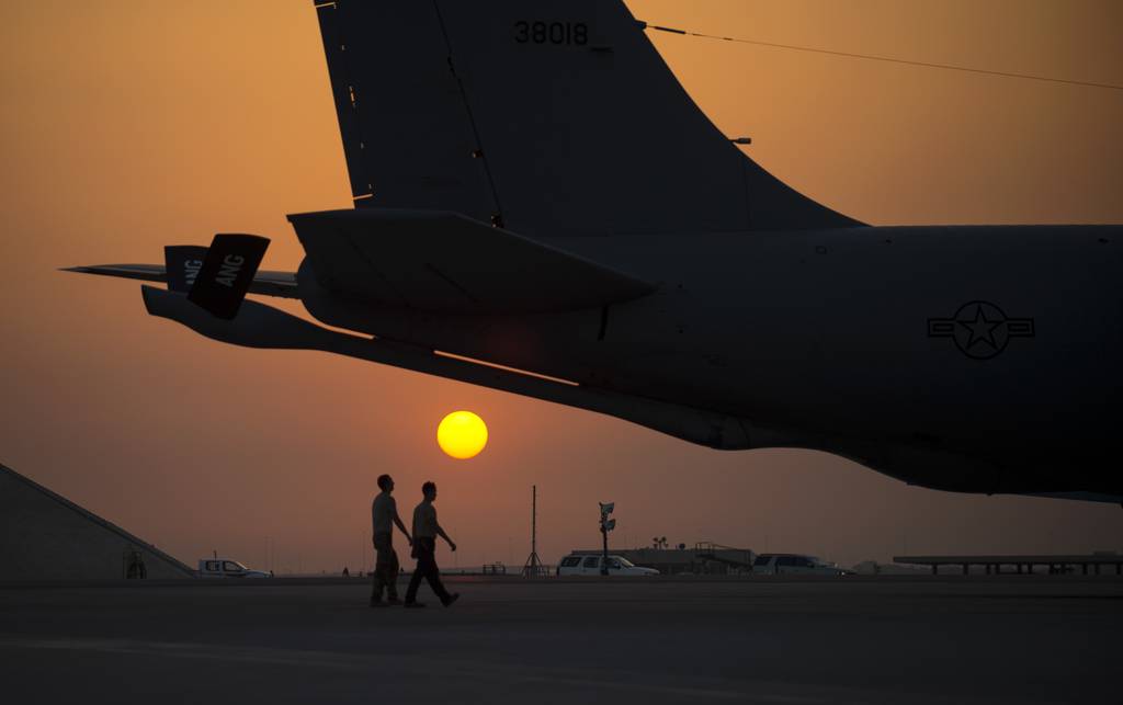 Airmen with the 379th Expeditionary Aircraft Maintenance Squadron prepare to conduct a pre-flight check on a KC-135 Stratotanker at Al Udeid Air Base, Qatar, June 8, 2017.